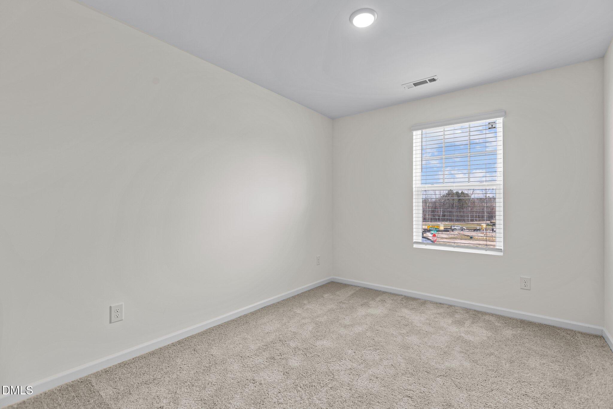 Exterior photo of 1004 Tofino Drive, Durham, NC 27704. MLS: 10191899