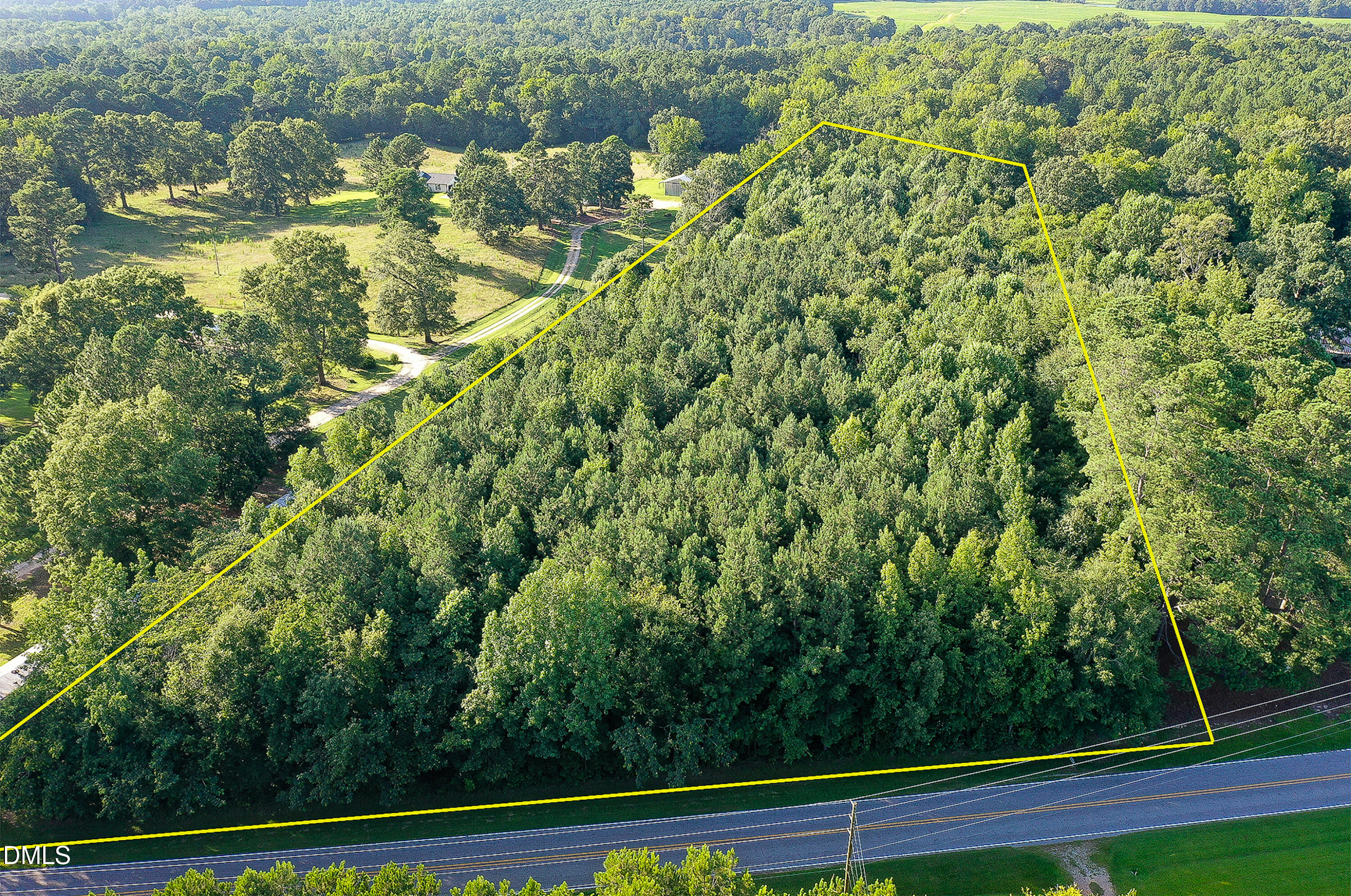 Exterior photo of 5.25 Acres Timberlake Road, Louisburg, NC 27549. MLS: 10184460