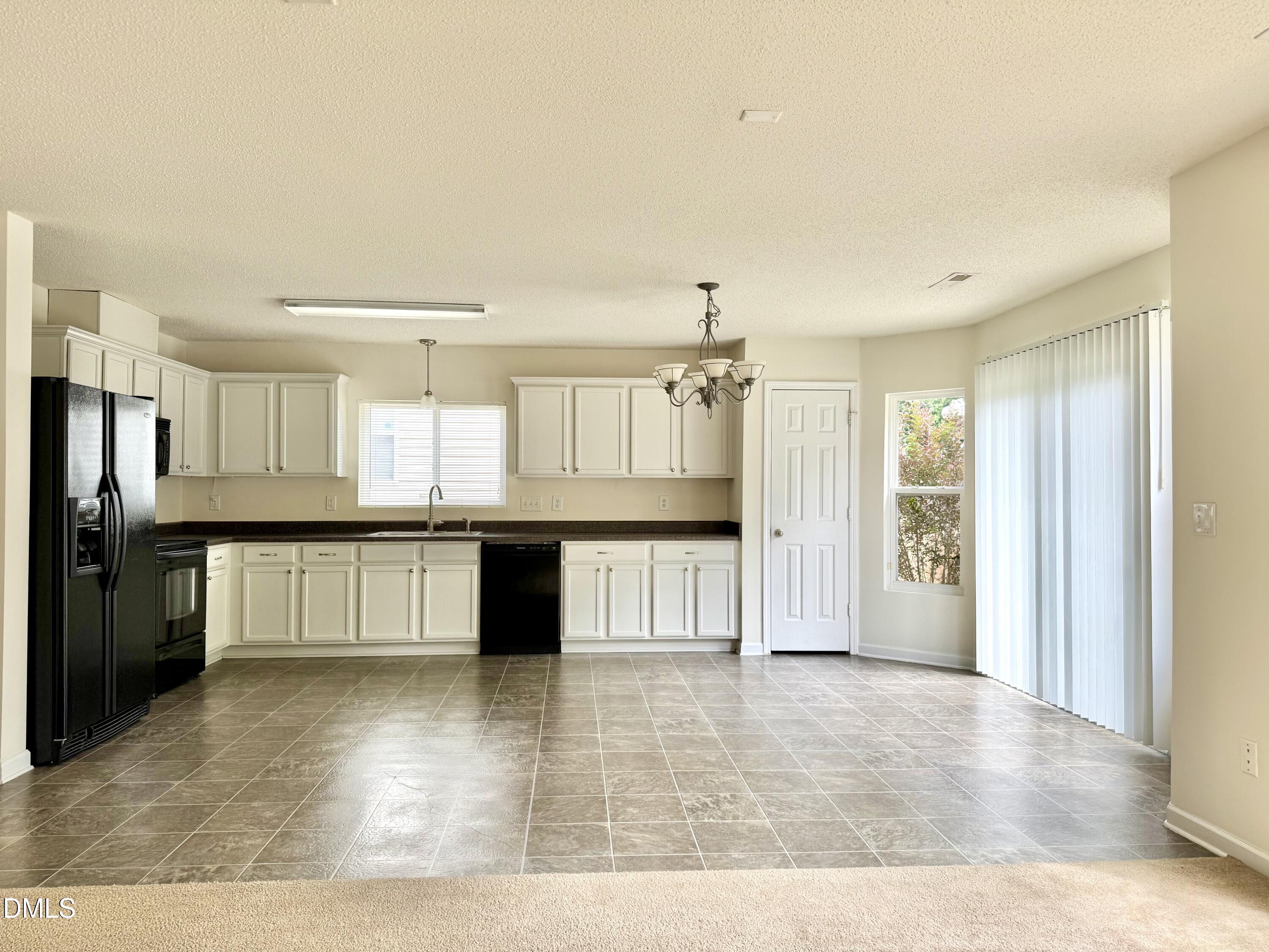 Exterior photo of 208 Knightwood Drive, Durham, NC 27703. MLS: 10173484
