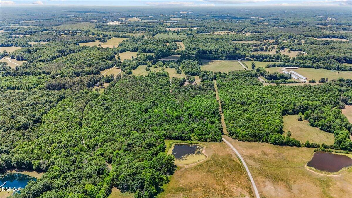 Exterior photo of Tbd Siler City Snow Camp Road, Snow Camp, NC 27349. MLS: 10179136