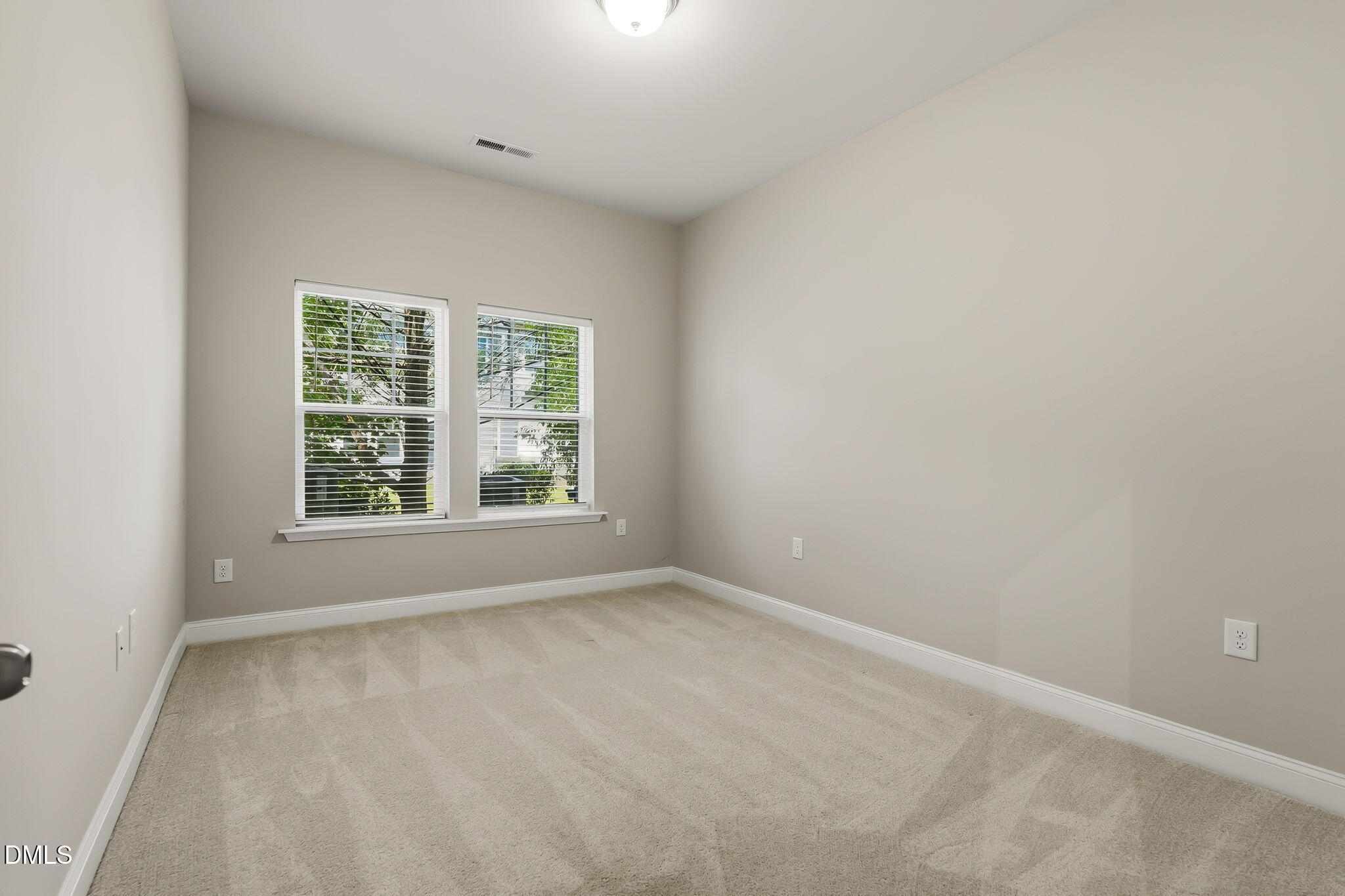 Exterior photo of 302 Fenella Drive, Raleigh, NC 27606. MLS: 10181117