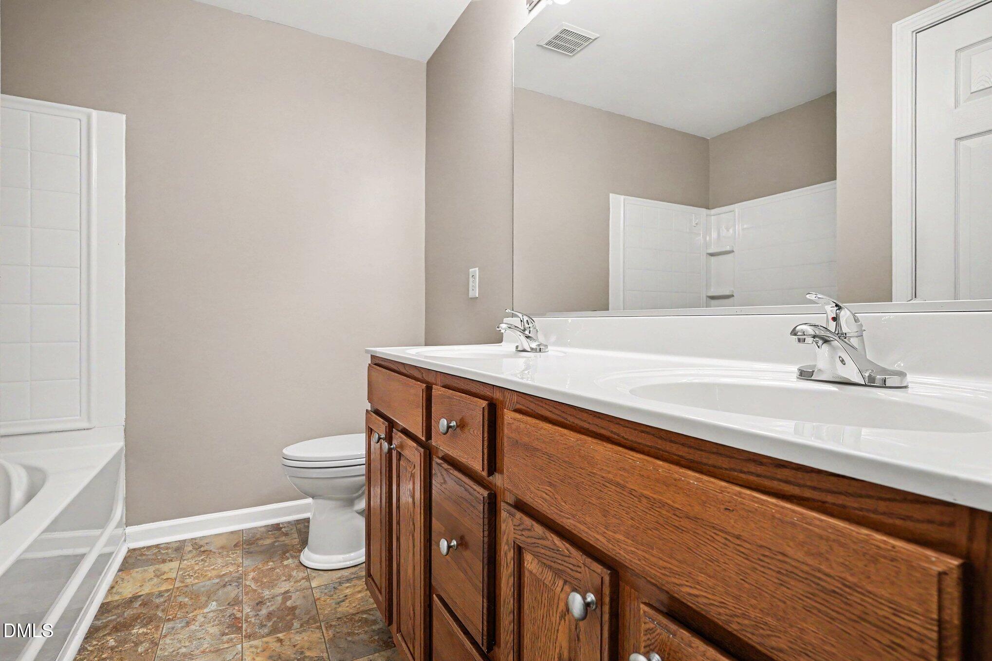 Exterior photo of 524 Hidden Springs Drive, Durham, NC 27703. MLS: 10175146