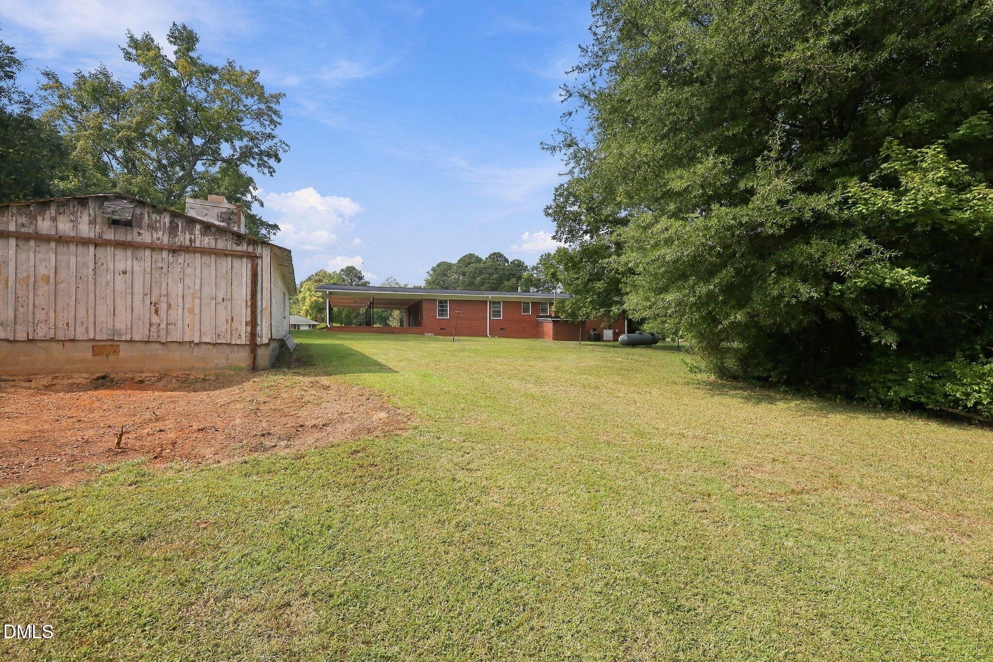 Exterior photo of 6909 Holly Springs Road, Raleigh, NC 27606. MLS: 10196173