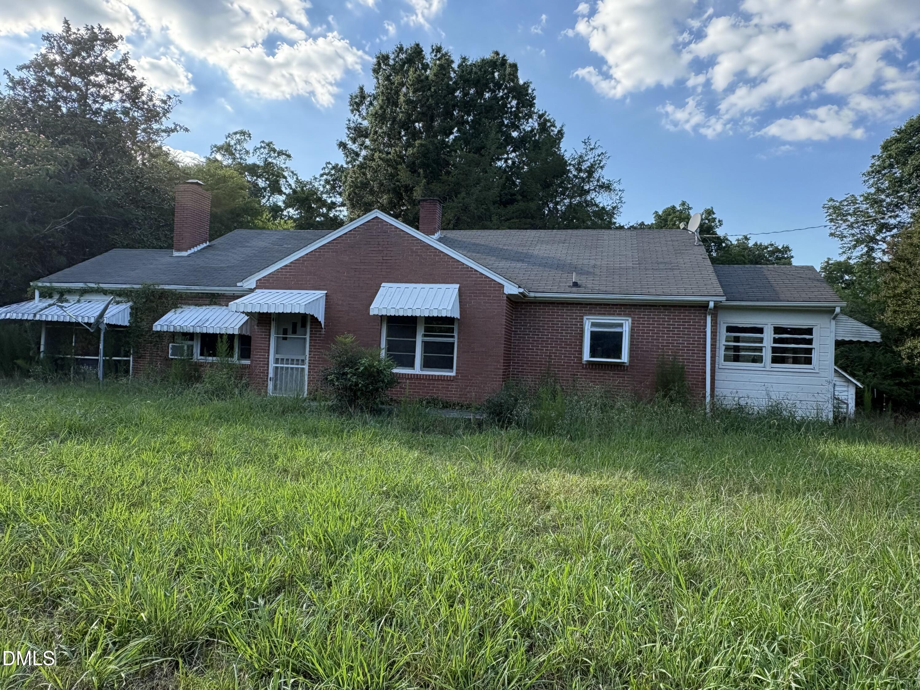 Exterior photo of 982 Castle Rock Farm Road, Pittsboro, NC 27312. MLS: 10185418
