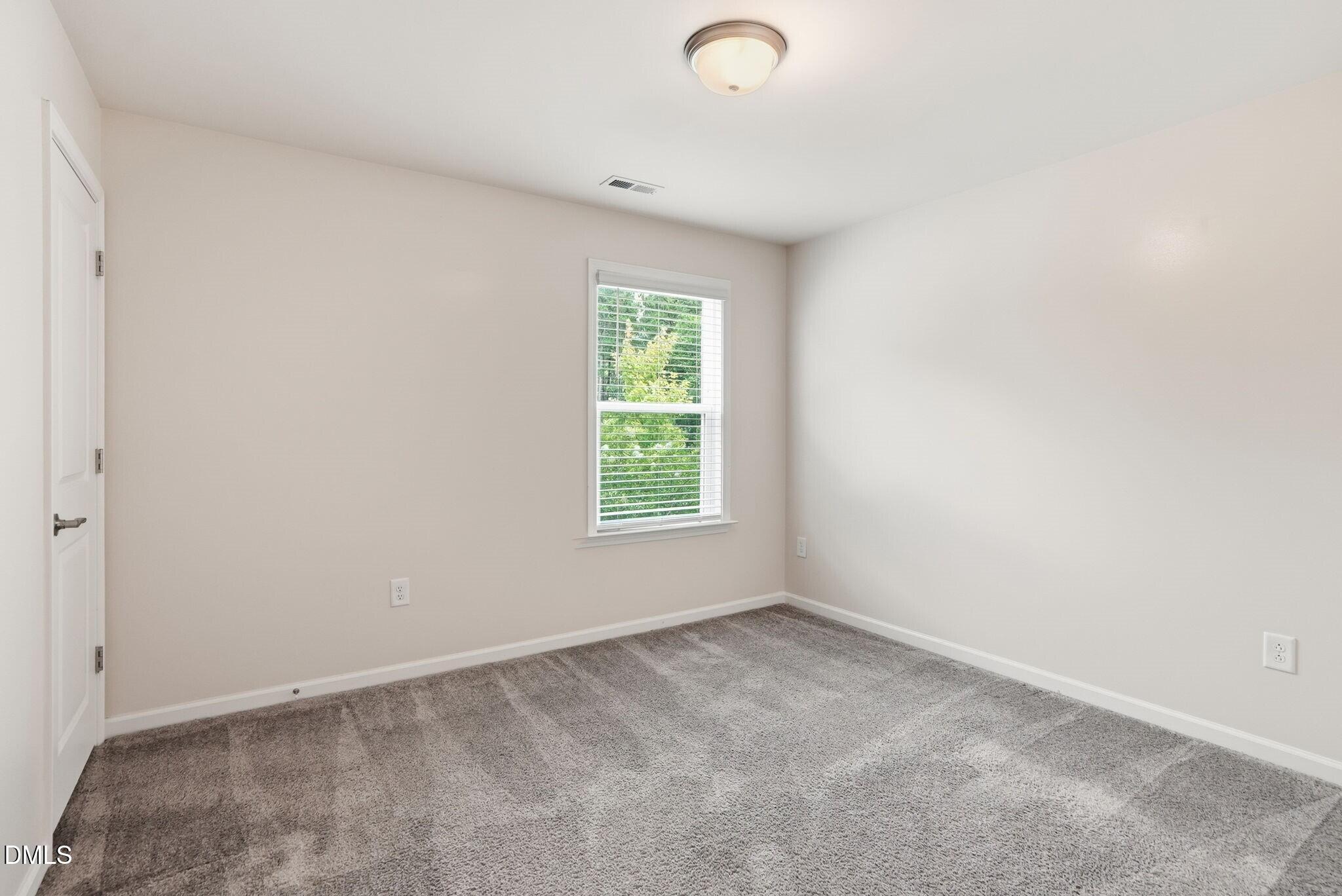 Exterior photo of 2601 Impulsion Drive, New Hill, NC 27562. MLS: 10180239