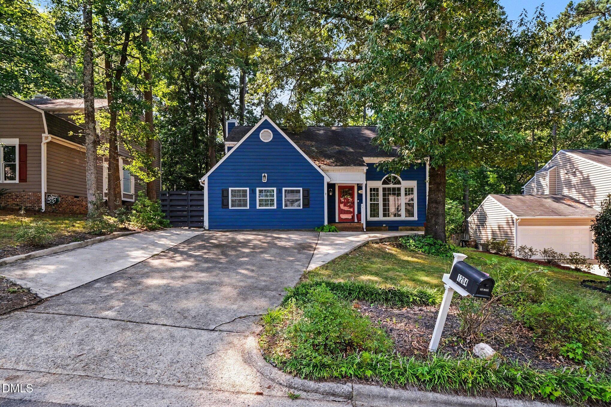 Exterior photo of 1204 Belhaven Road, Cary, NC 27513. MLS: 10188336