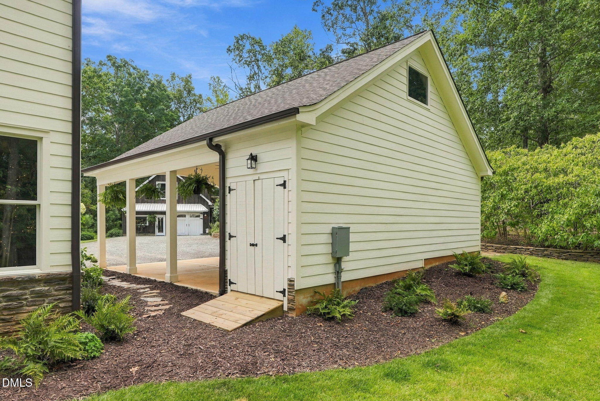 Exterior photo of 977 Windy Ridge Road, Chapel Hill, NC 27517. MLS: 10169281
