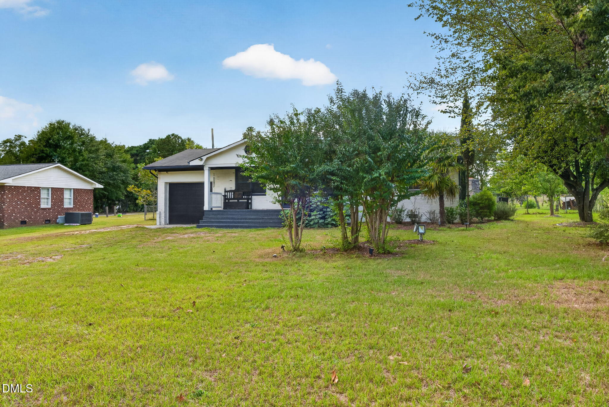 Exterior photo of 209 Chic Ennis Road, Coats, NC 27521. MLS: 10196097