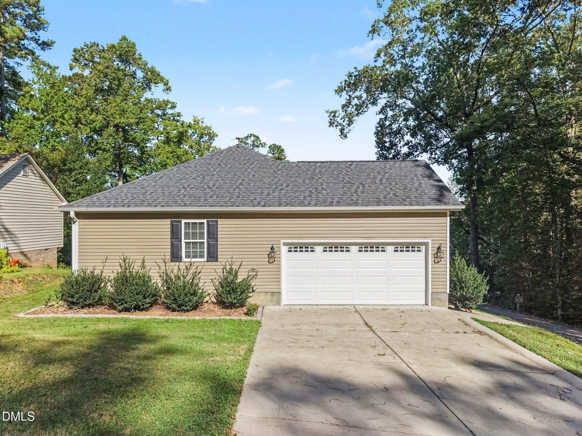 Exterior photo of 831 Eagles Nest Drive, Sanford, NC 27332. MLS: 10192831