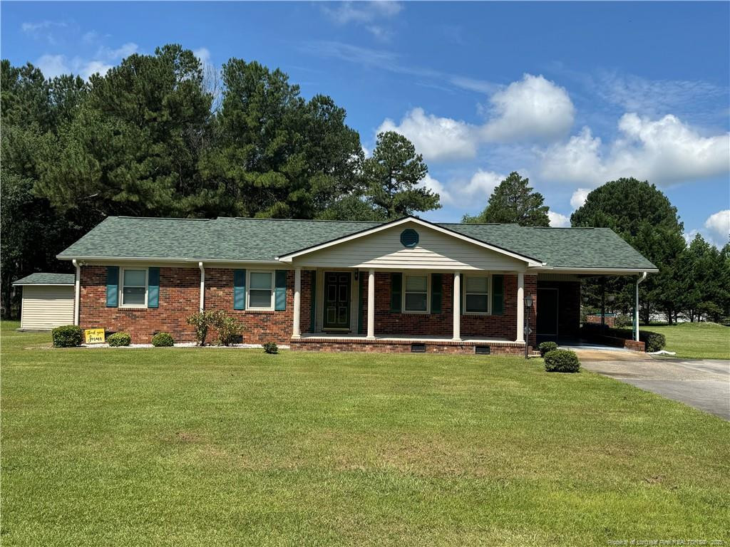 Exterior photo of 1426 Red Springs Road, Raeford, NC 28376. MLS: 747539