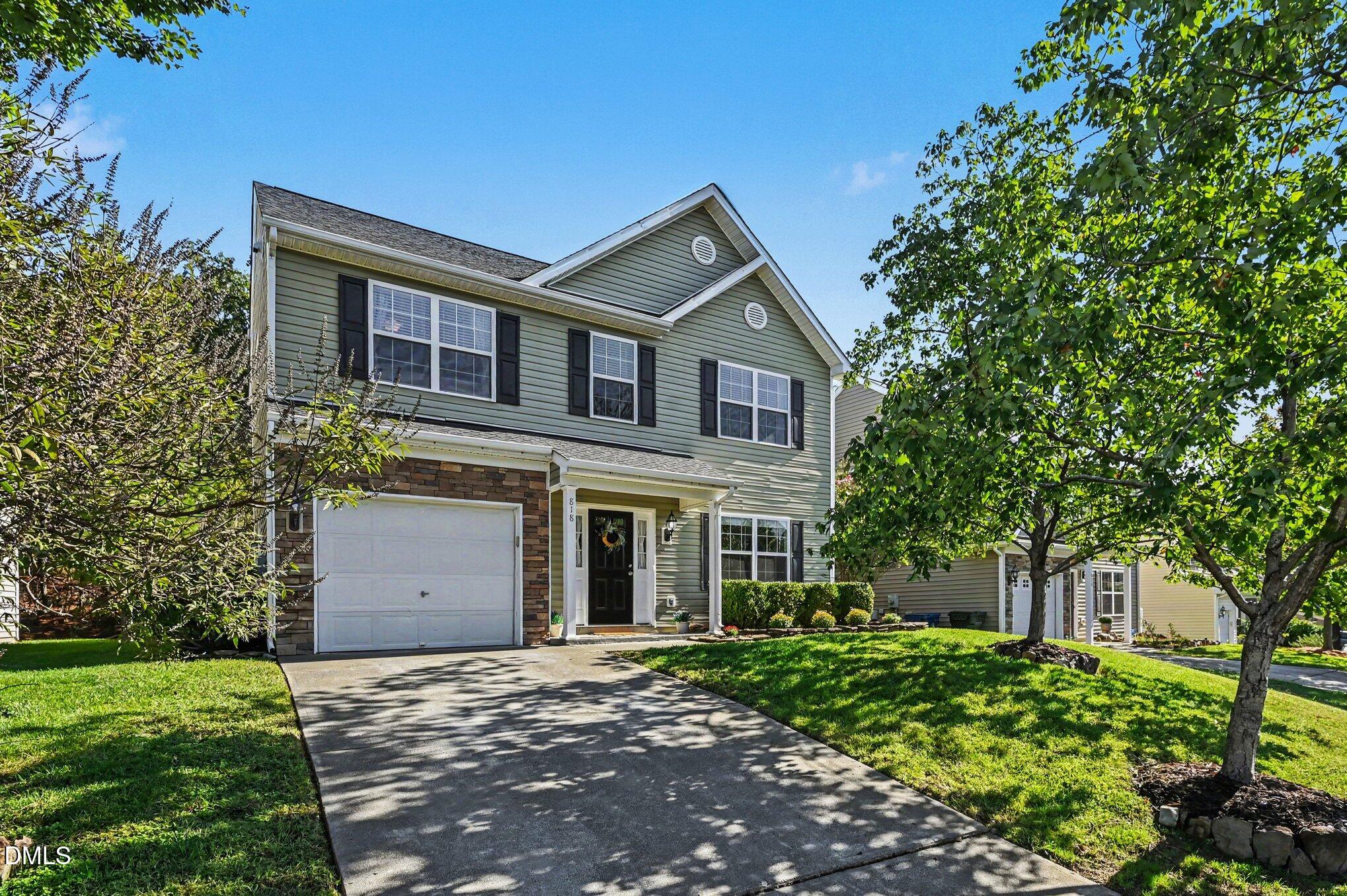 Exterior photo of 818 Woodside Park Lane, Durham, NC 27704. MLS: 10196635