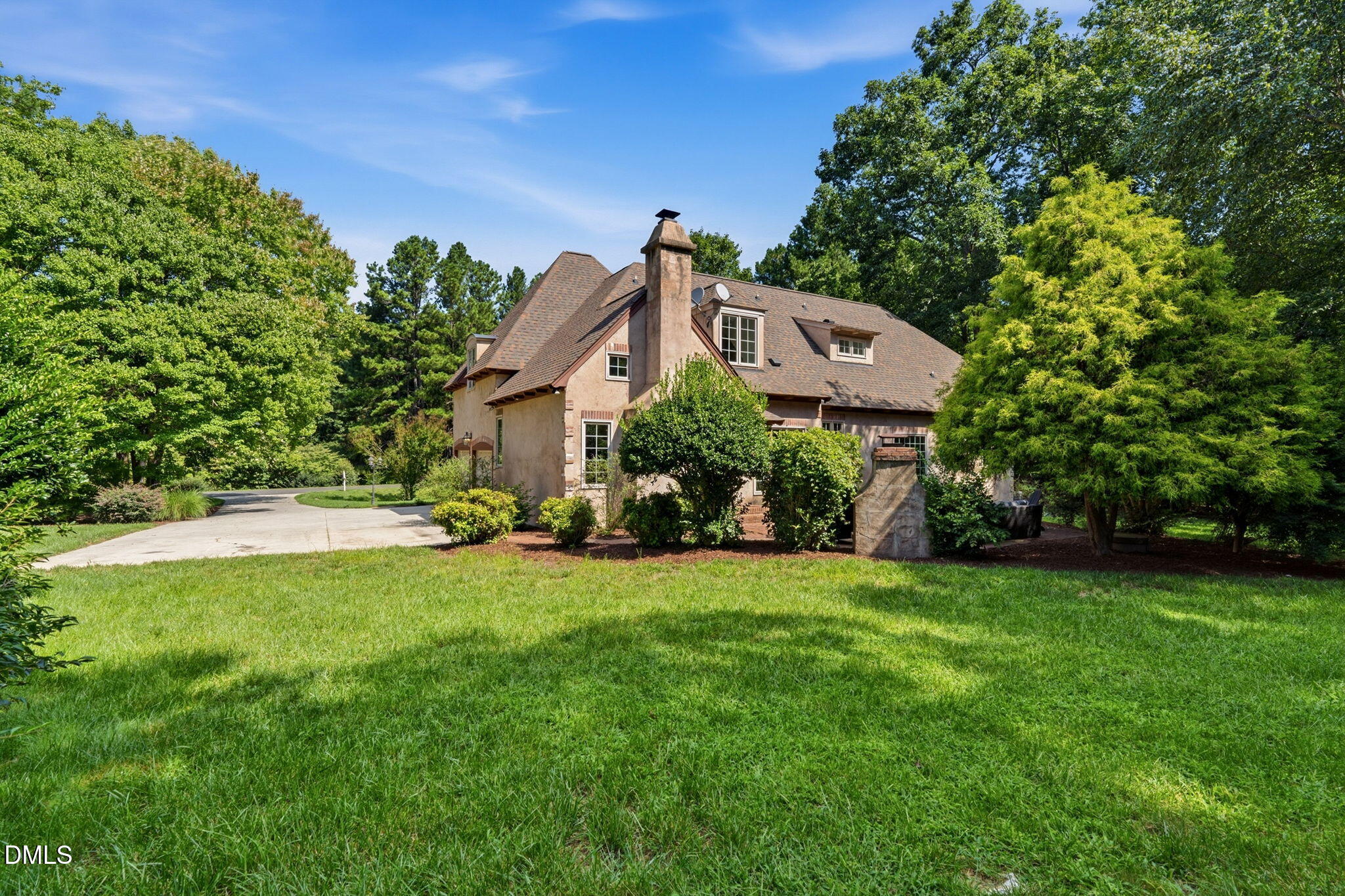 Exterior photo of 1005 Woodlot Ridge Road, Chapel Hill, NC 27516. MLS: 10197812