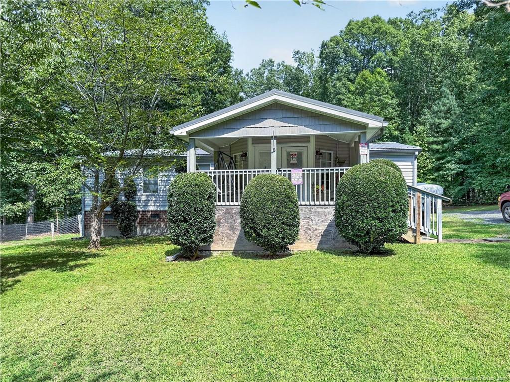 Exterior photo of 6094 Cindy Lane, Oxford, NC 27565. MLS: 768734