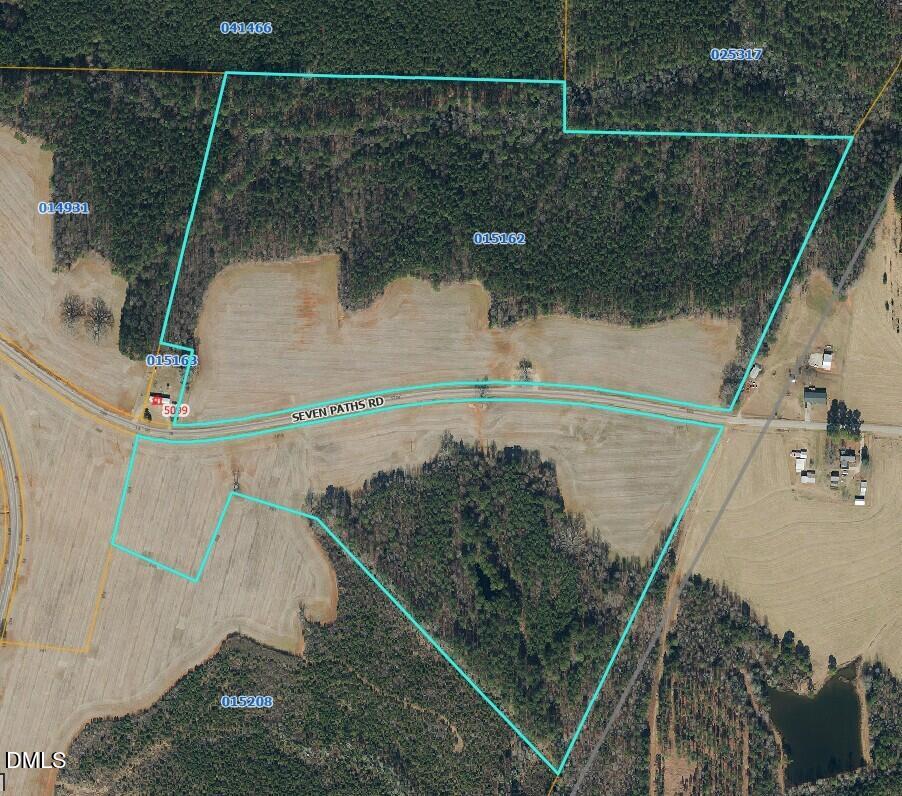 Aerial parcel map outlining wooded and cleared land along Seven Paths Road.