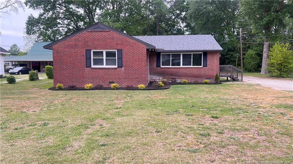 Exterior photo of 212 Peachtree Street, Red Springs, NC 28377. MLS: 761020