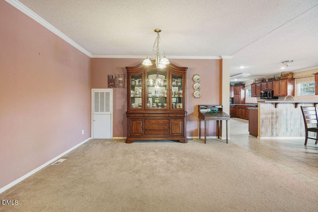 Exterior photo of 412 Joe Collins Road, Lillington, NC 27546. MLS: 10191550