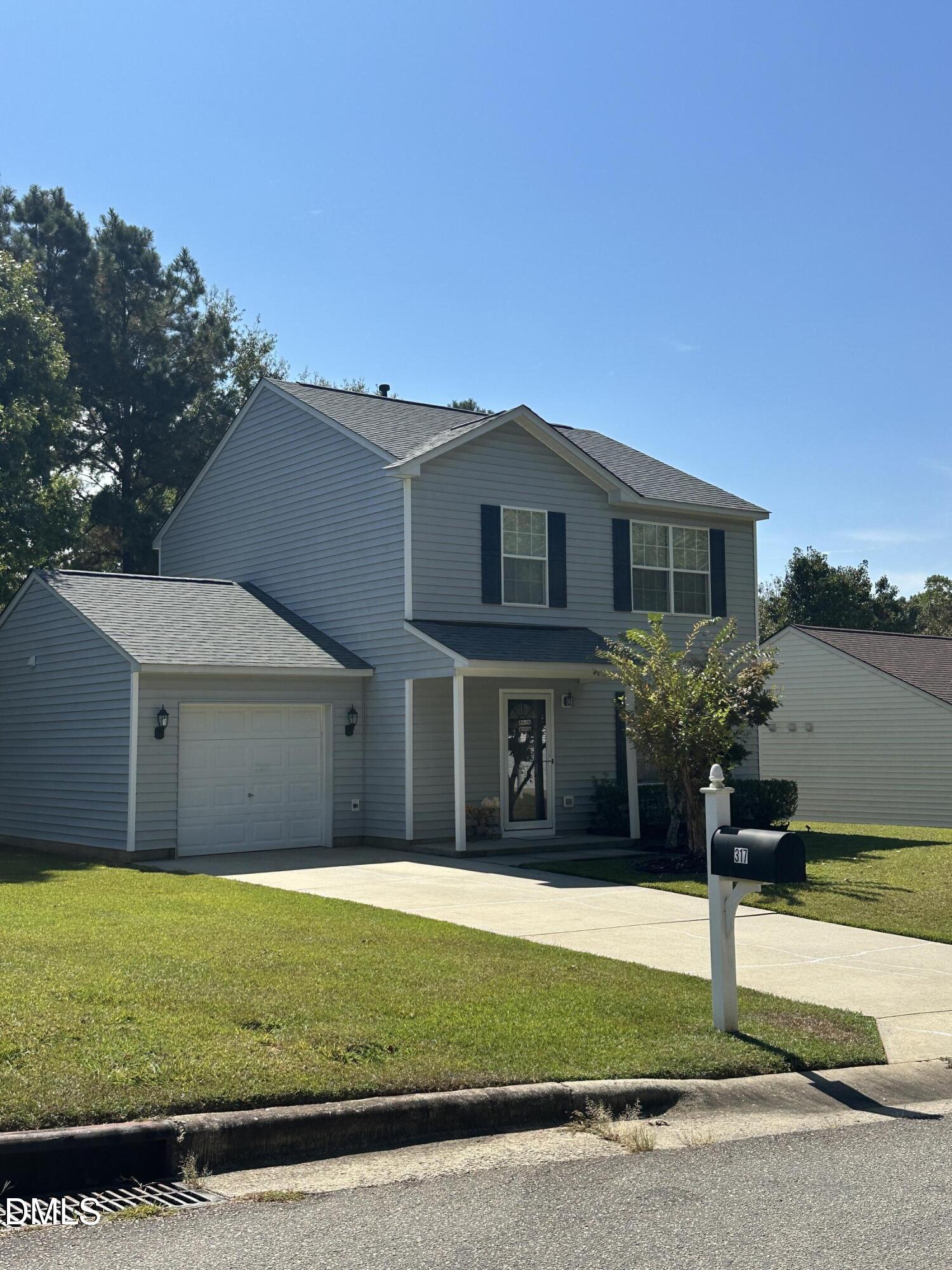 Exterior photo of 317 Providence Hall Drive, Sanford, NC 27330. MLS: 10174438