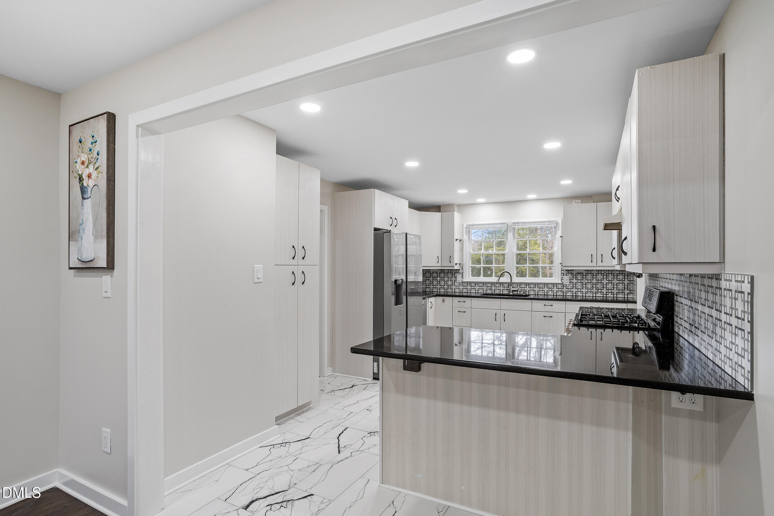 Exterior photo of 305 E Millbrook Road, Raleigh, NC 27609. MLS: 10179210