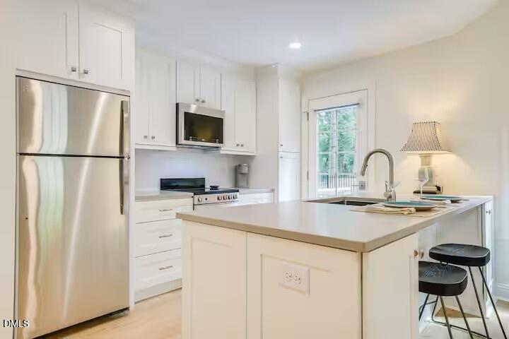 Exterior photo of 3516 Ranlo Drive, Raleigh, NC 27612. MLS: 10176574