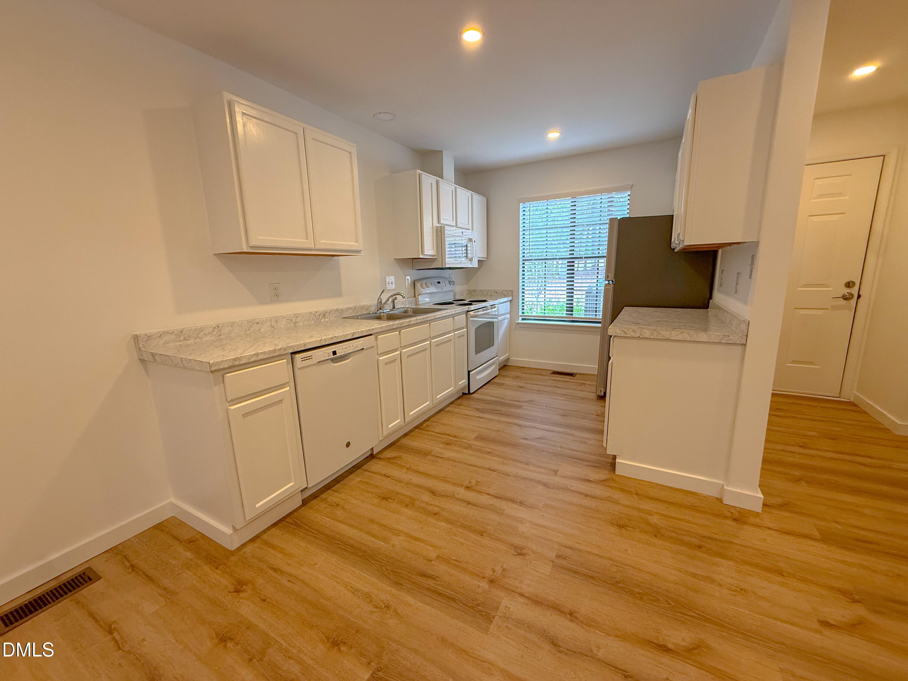 Exterior photo of 4247 The Oaks Drive, Raleigh, NC 27606. MLS: 10168508