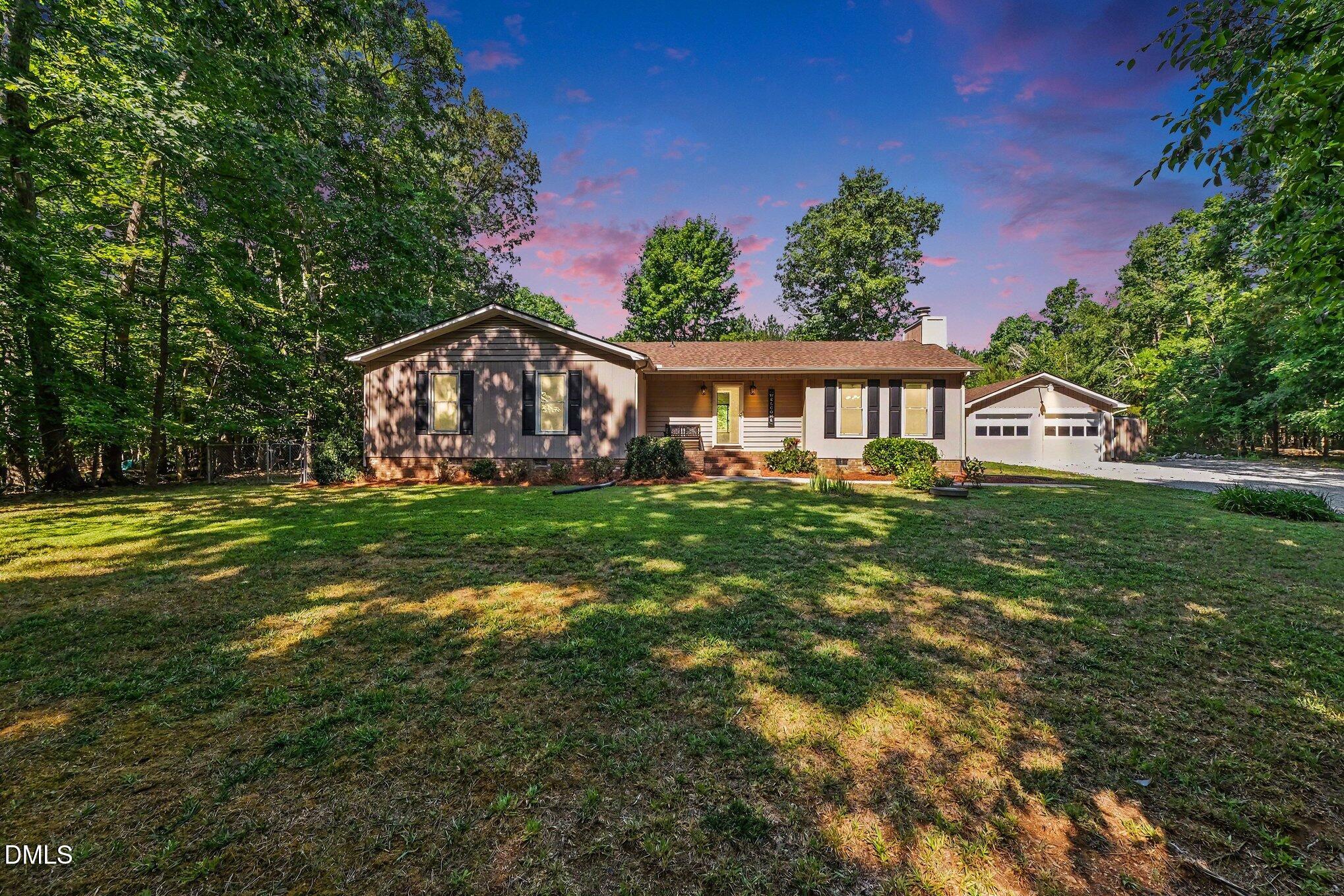 Exterior photo of 7711 Quail Hollow Drive, Hillsborough, NC 27278. MLS: 10179272