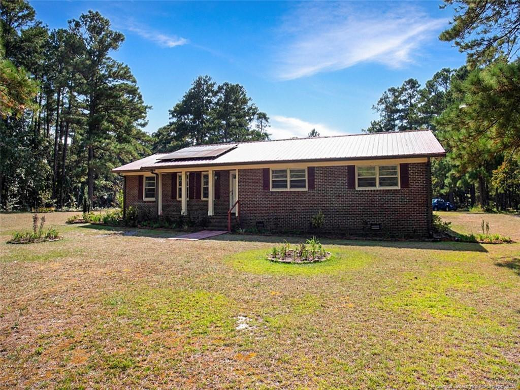 Exterior photo of 6456 Cedar Creek Road, Fayetteville, NC 28312. MLS: 750219