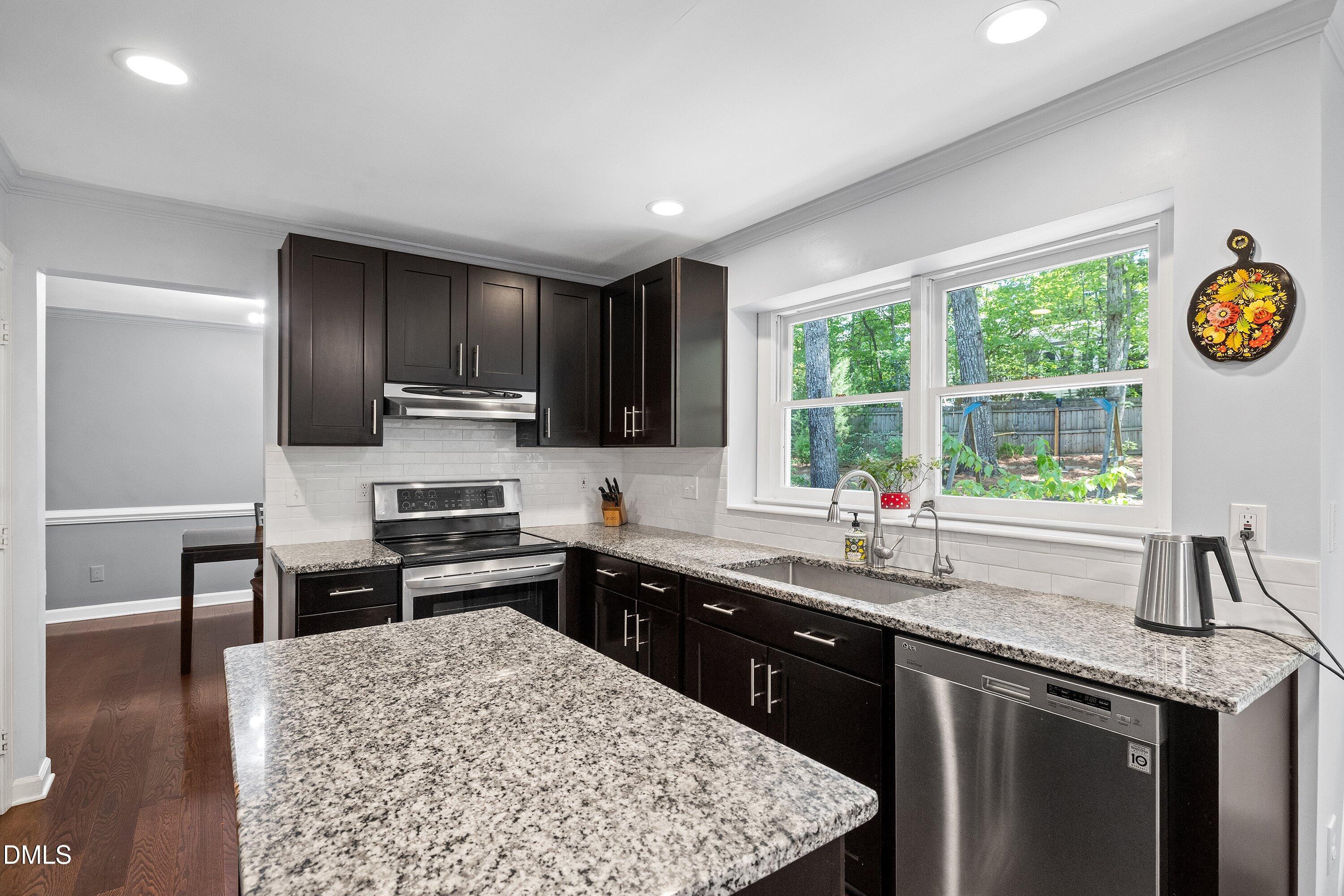 Exterior photo of 1409 Bridgeport Drive, Raleigh, NC 27615. MLS: 10190701