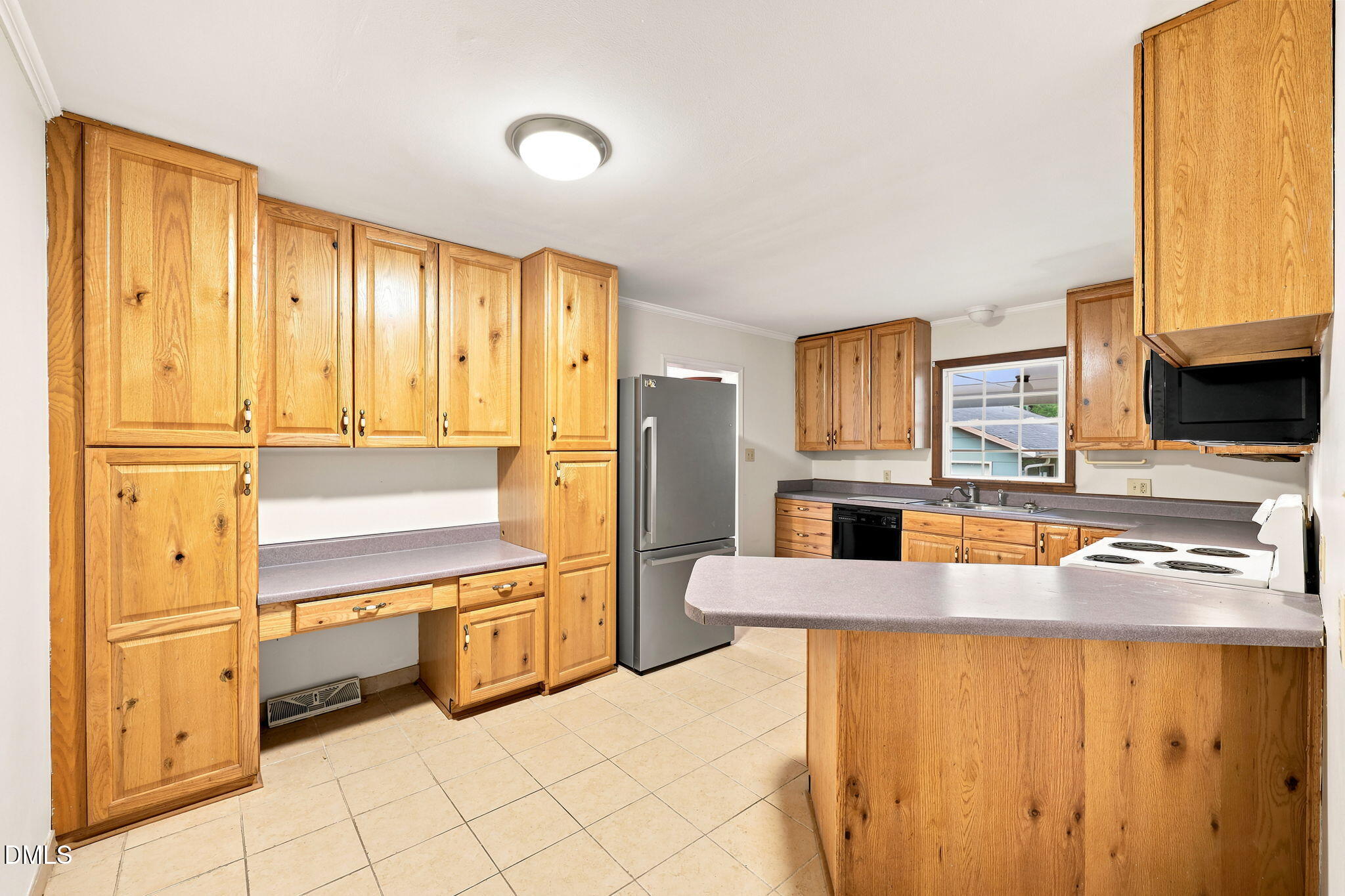 Exterior photo of 719 Greenwood Drive, Burlington, NC 27217. MLS: 10181878
