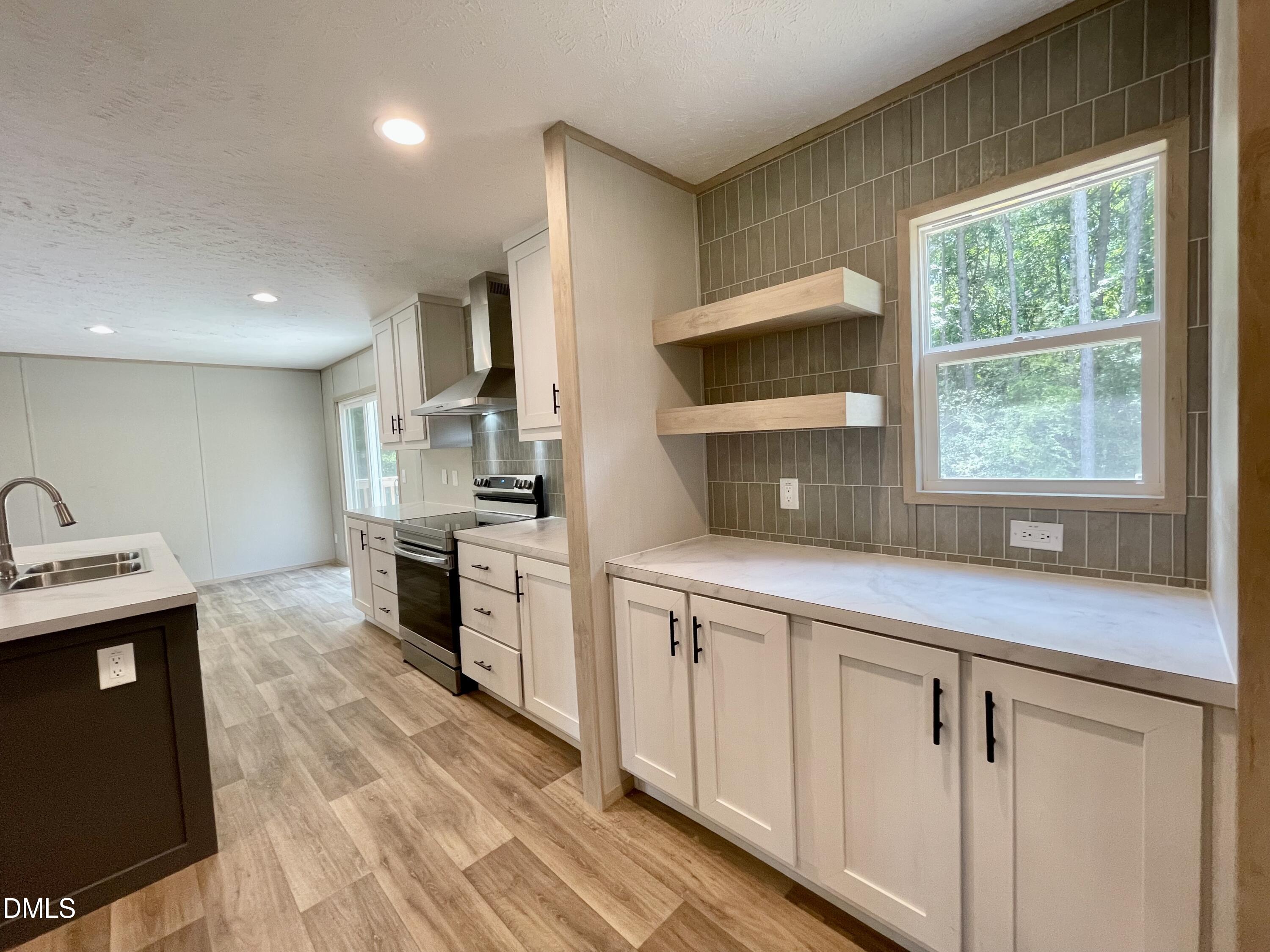 Exterior photo of 978 Mcneill Hobbs Road, Bunnlevel, NC 28323. MLS: 10185562