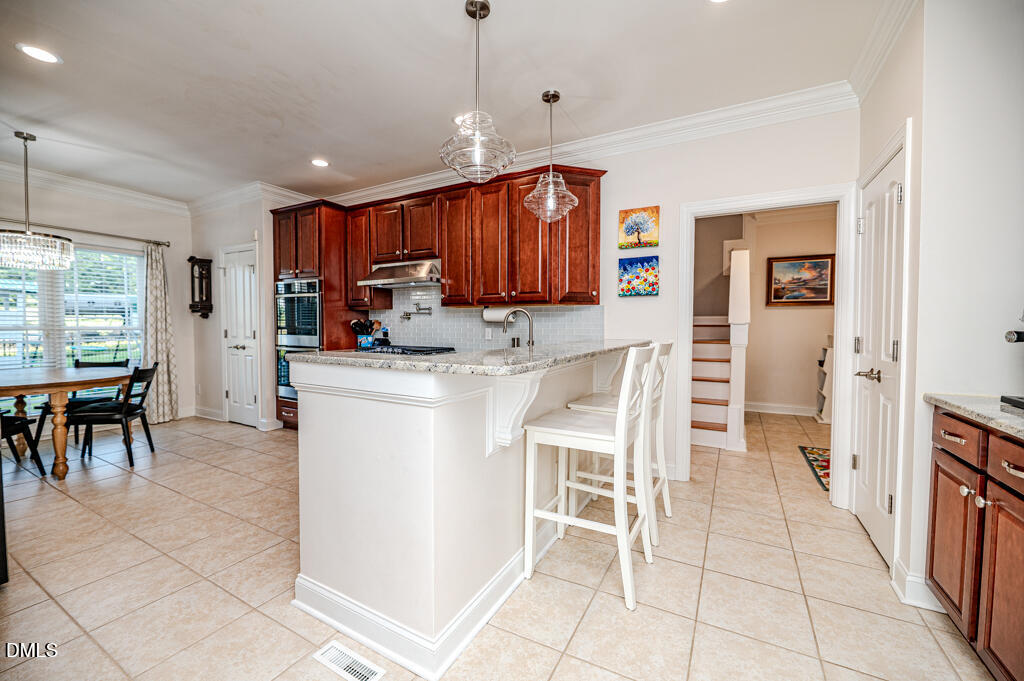 Exterior photo of 1200 Graedon Drive, Raleigh, NC 27603. MLS: 10184554