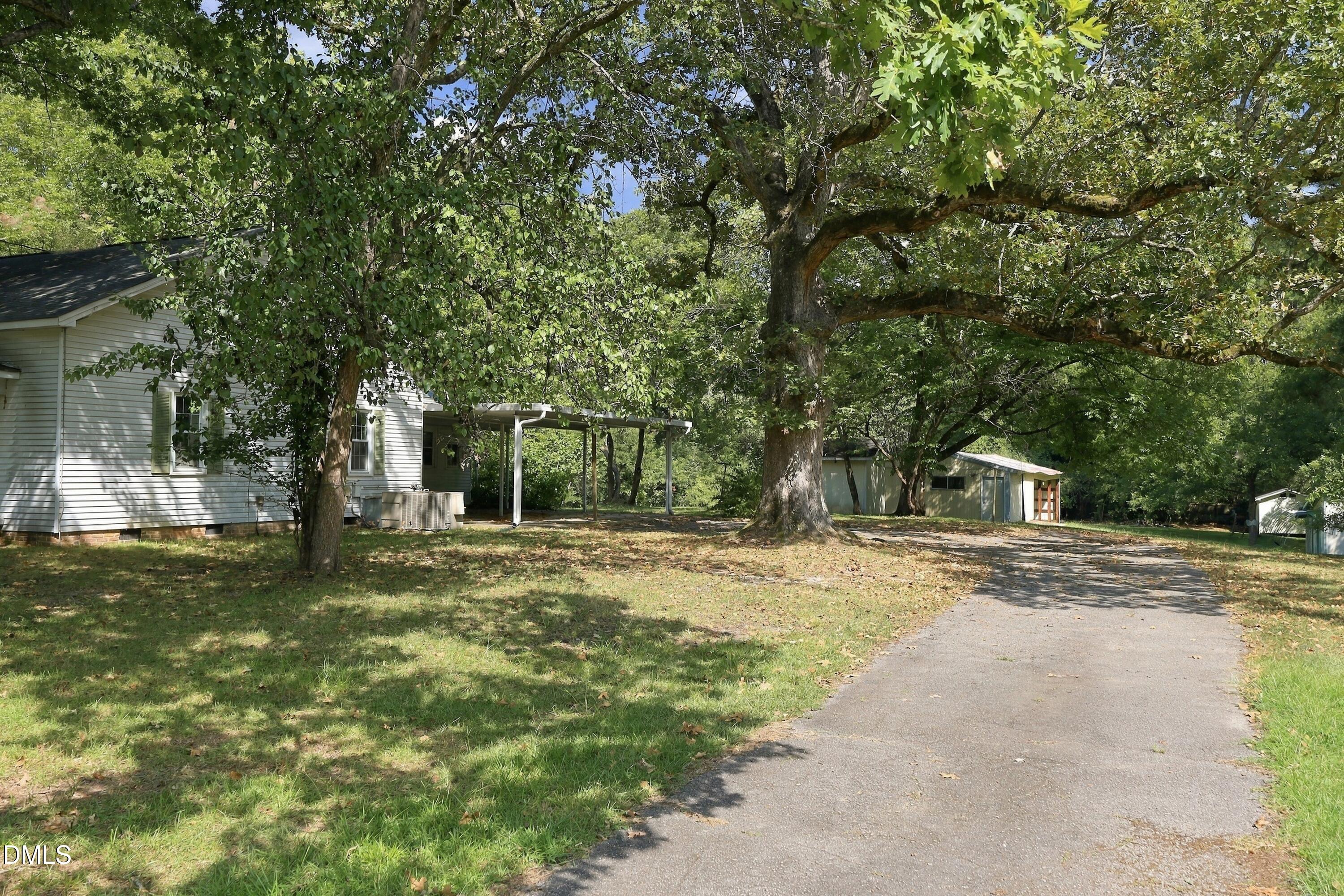 Exterior photo of 5033 Theys Road, Raleigh, NC 27606. MLS: 10192735