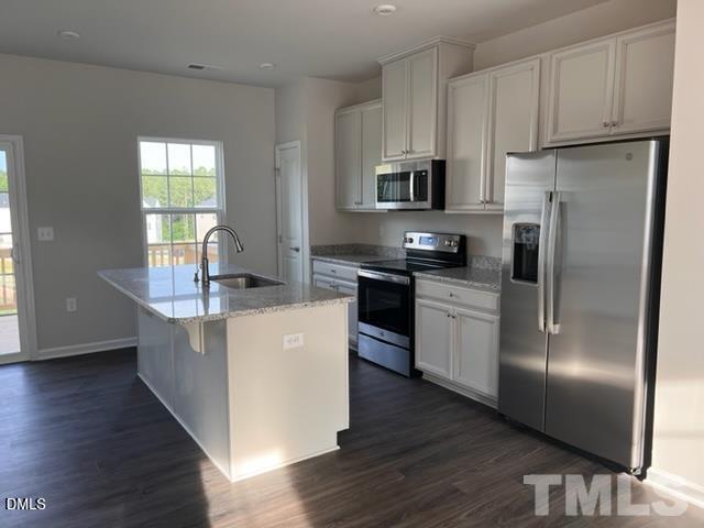 Exterior photo of 1009 Romeria Drive, Durham, NC 27713. MLS: 10186485