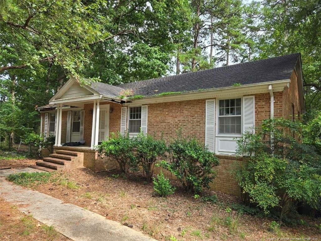 Exterior photo of 5209 Sedgefield Drive, Raleigh, NC 27609. MLS: 768165