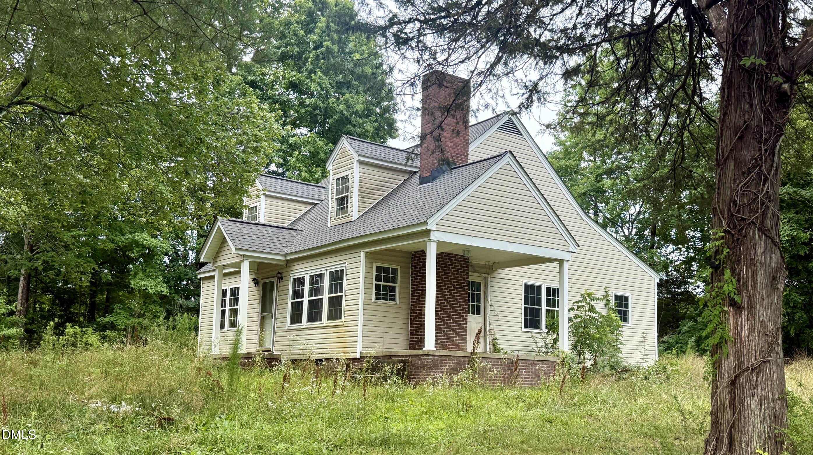 Exterior photo of 1132 Ben Sharpe Road, Elon, NC 27244. MLS: 10175578