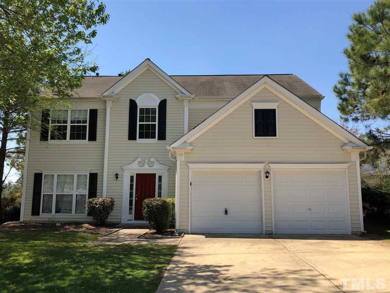 Exterior photo of 409 Grassy Point Road, Apex, NC 27502. MLS: 10191150