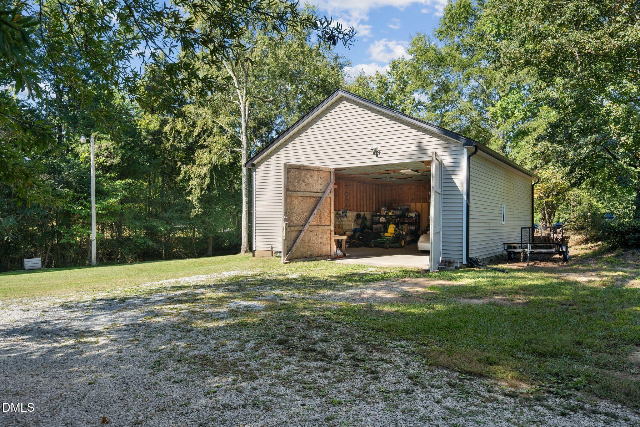 Exterior photo of 212 Shady Grove Drive, Timberlake, NC 27583. MLS: 10195945