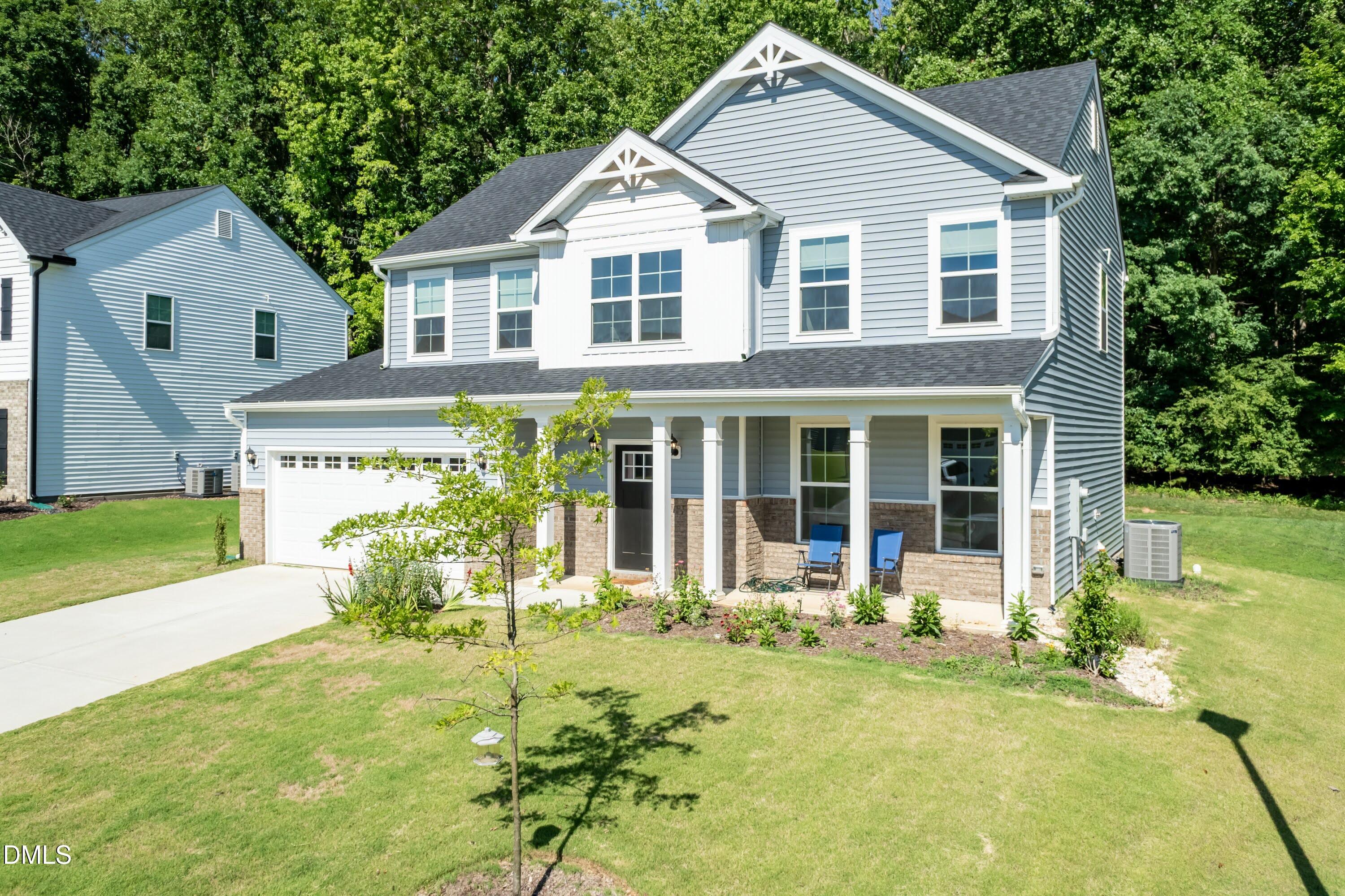 Exterior photo of 395 Oak Park Boulevard, Youngsville, NC 27596. MLS: 10172219