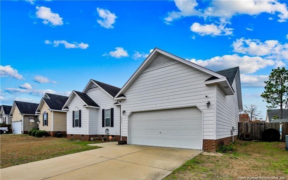Exterior photo of 2232 Cliff Swallow Drive, Fayetteville, NC 28306. MLS: 768760