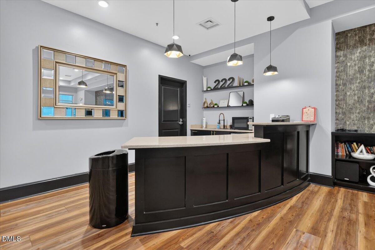 Exterior photo of 222 Glenwood Avenue 212, Raleigh, NC 27603. MLS: 10176251