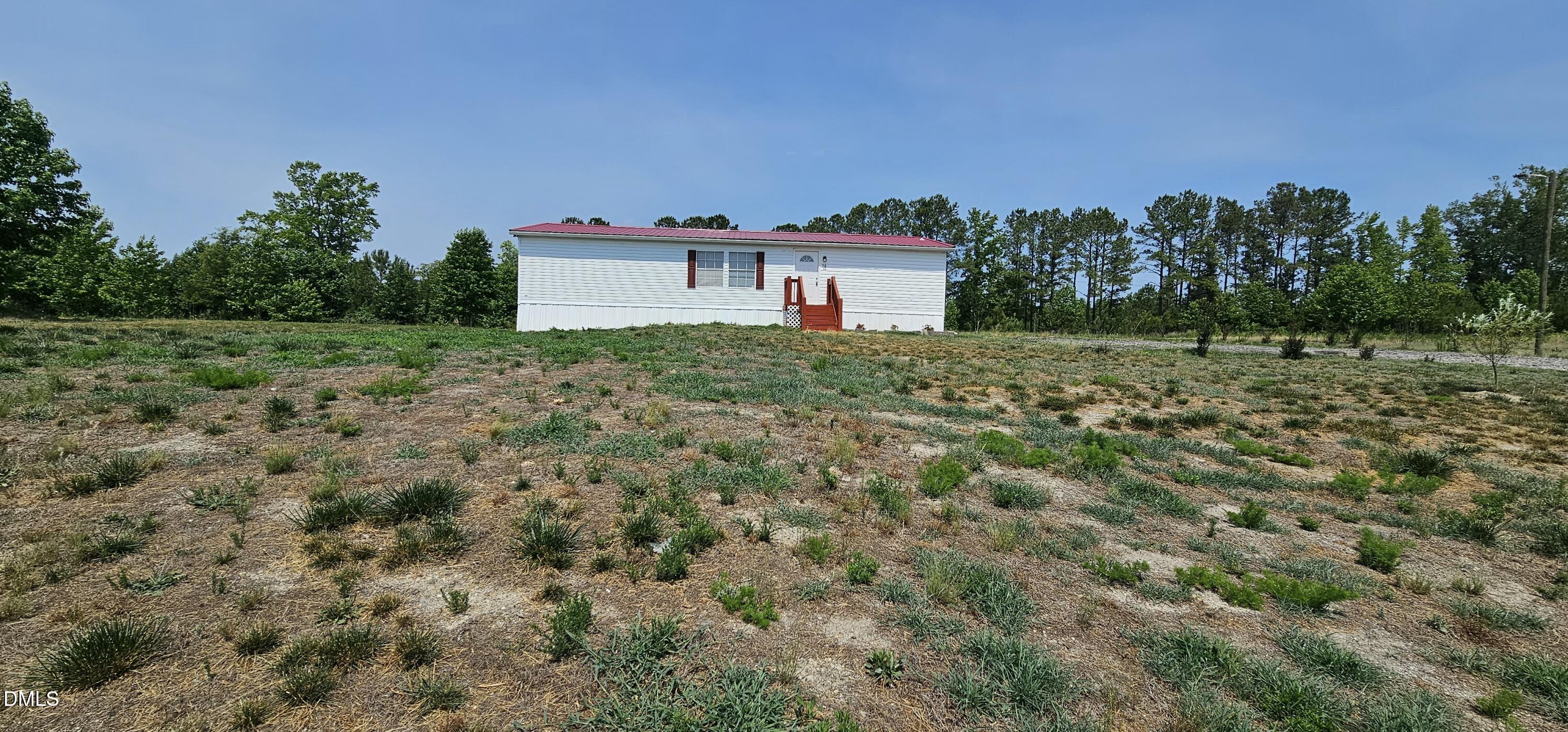 Exterior photo of 70 Waterfront Drive, Louisburg, NC 27549. MLS: 10174032