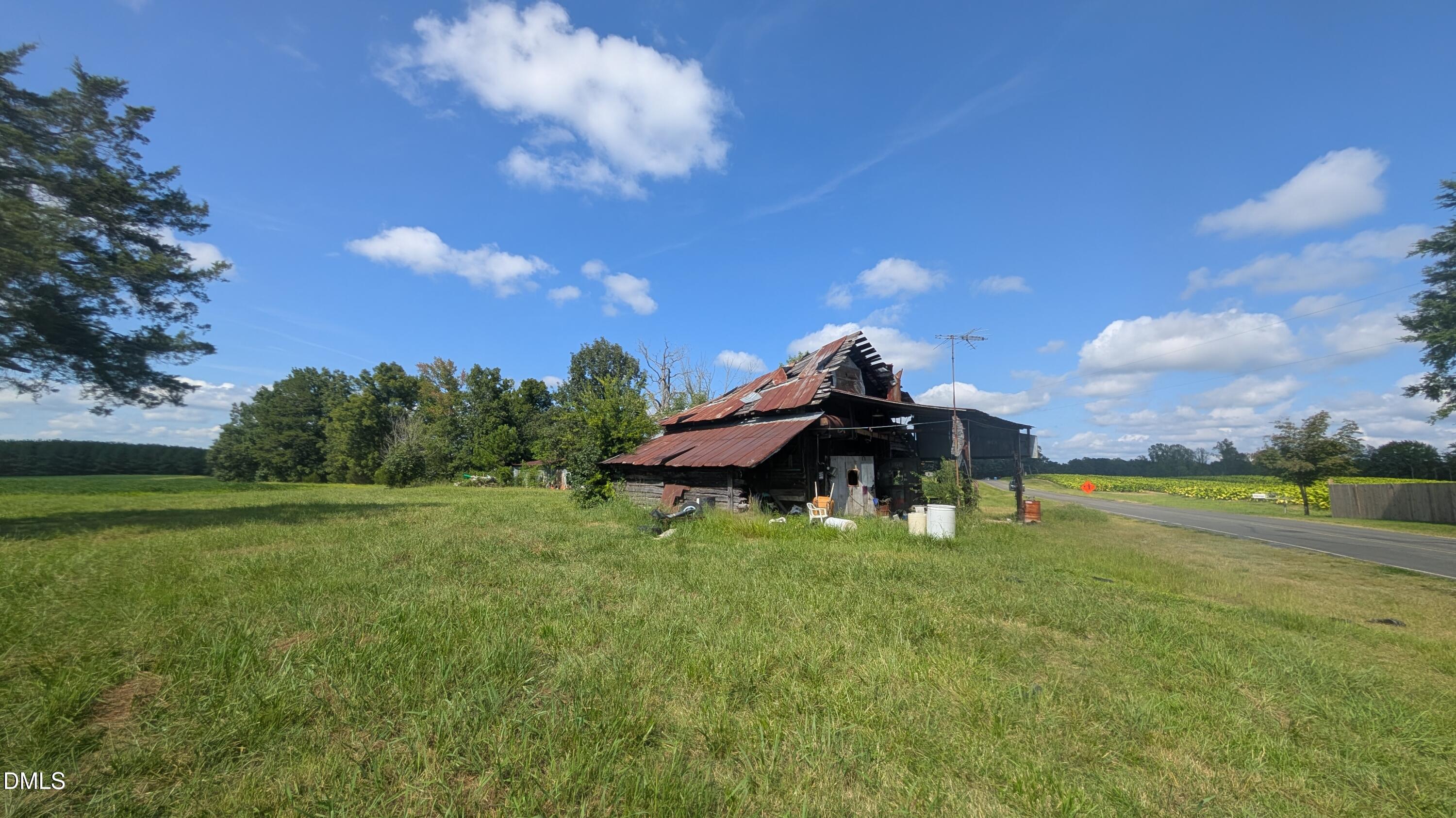 Exterior photo of 1222 Charlie Carr Road, Roxboro, NC 27574. MLS: 10188445