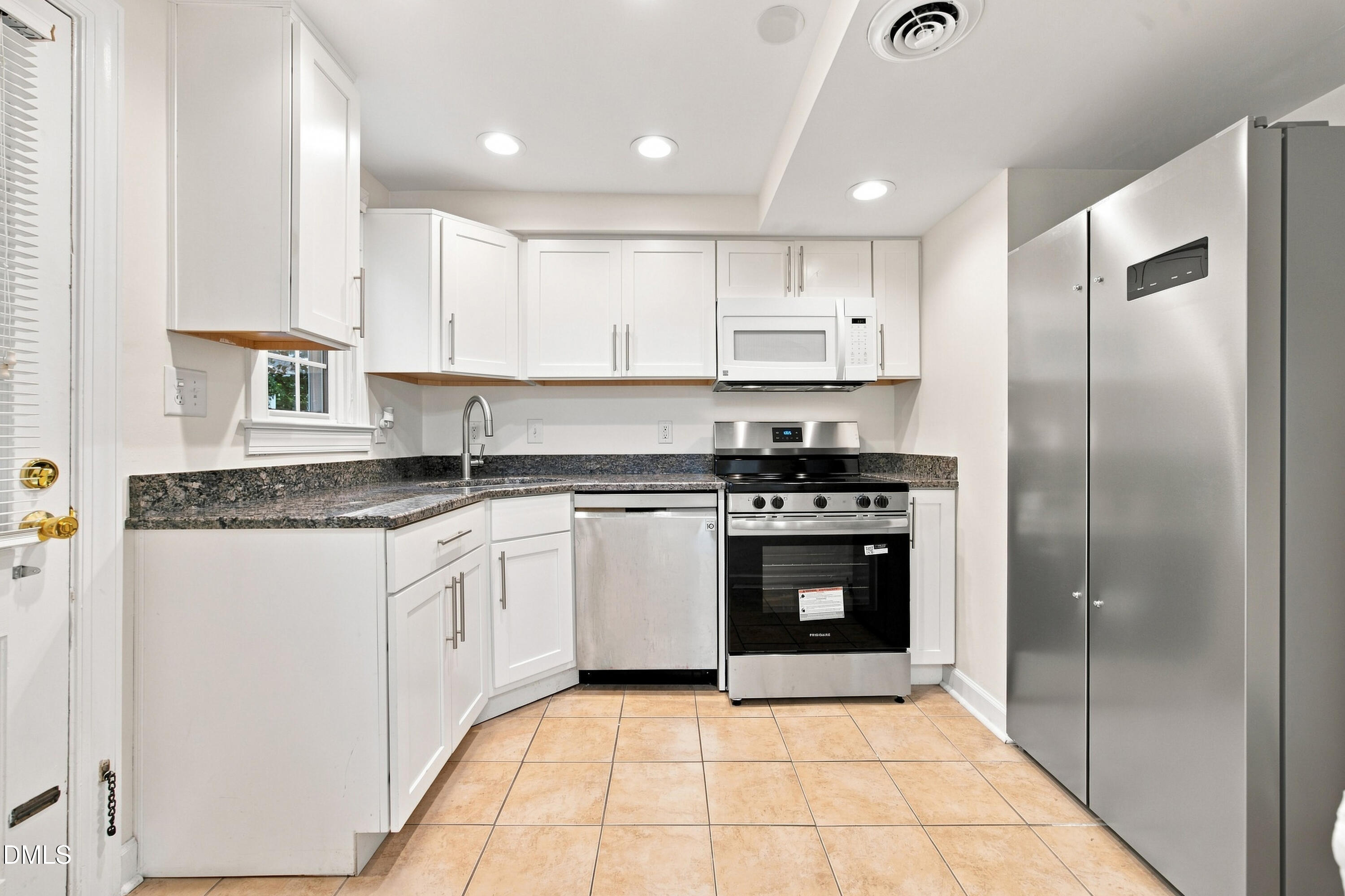 Exterior photo of 1649 Sutton Drive, Raleigh, NC 27605. MLS: 10190250