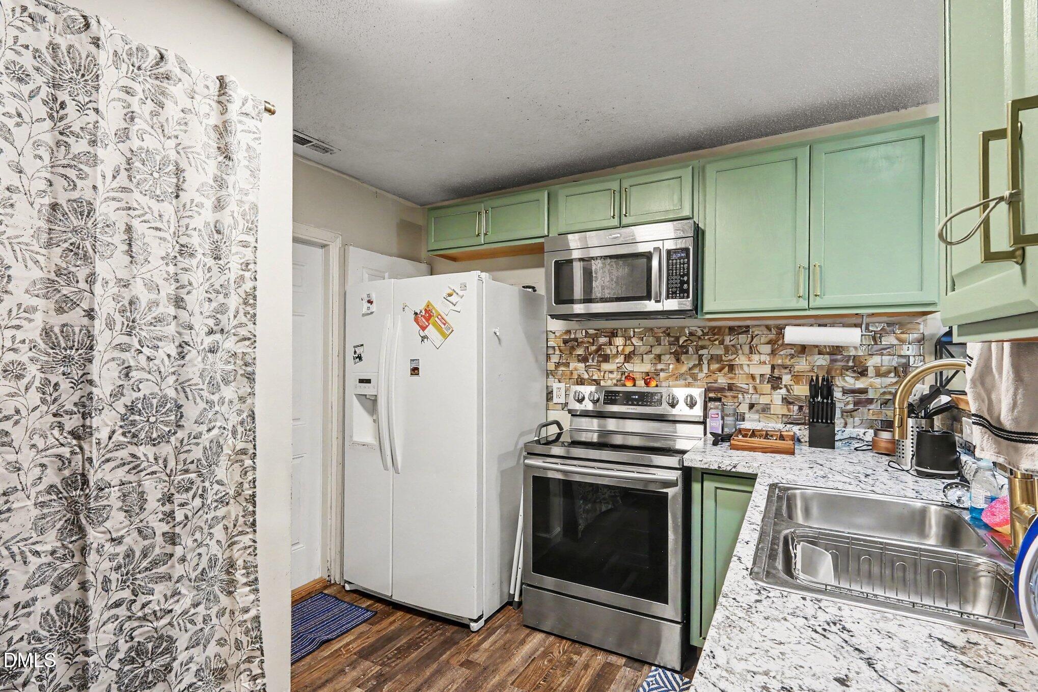 Exterior photo of 1714 Fox Hollow Drive, Raleigh, NC 27610. MLS: 10194775