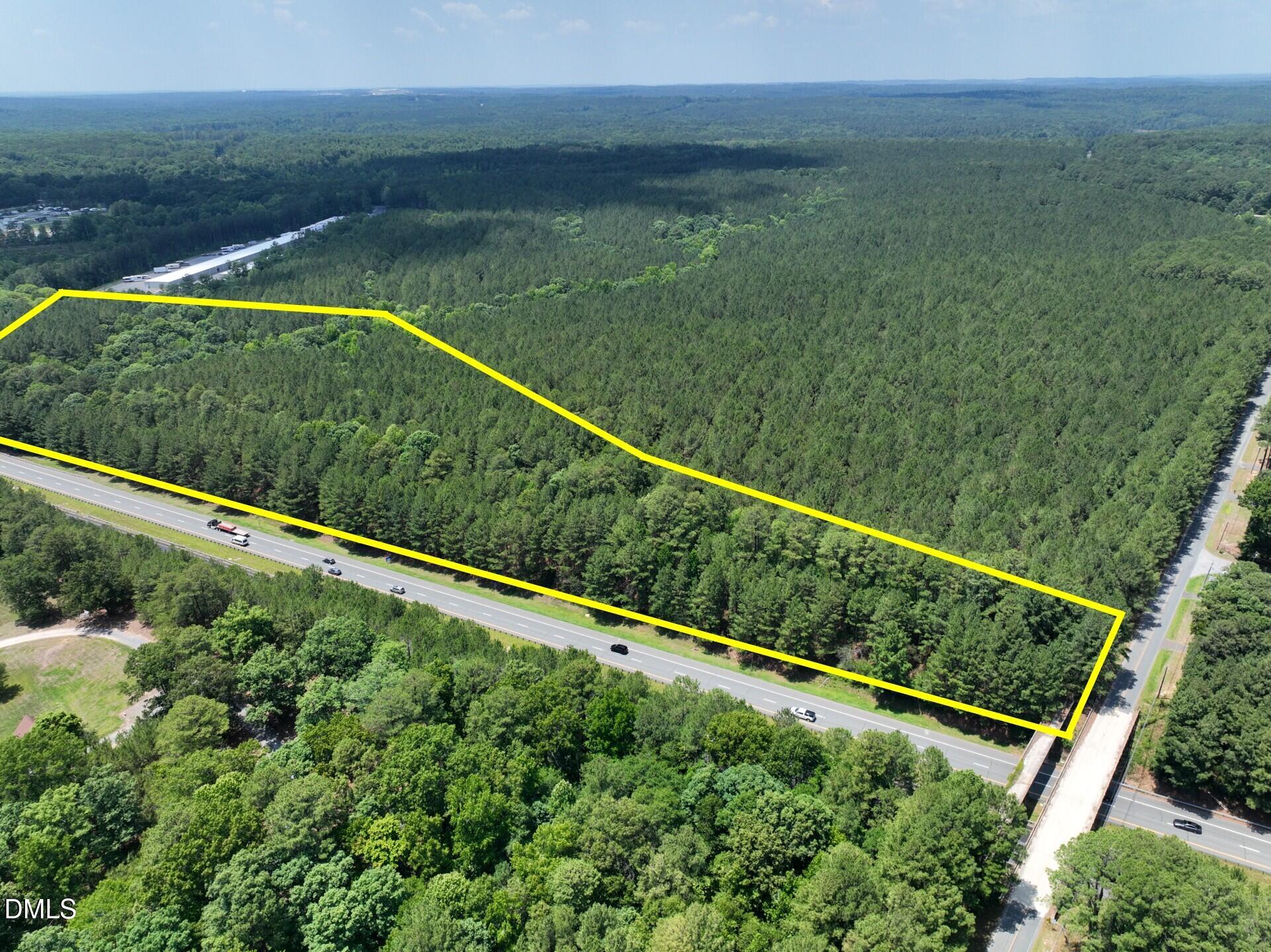 Exterior photo of 0 Moncure School Road, Moncure, NC 27559. MLS: 10178175