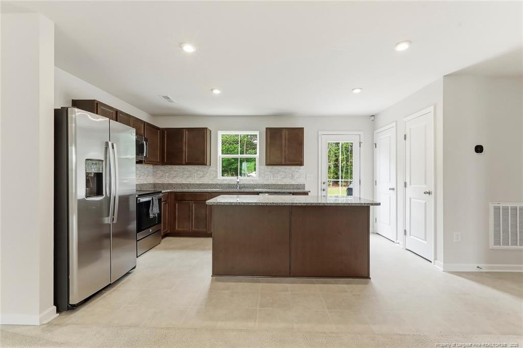 Exterior photo of 225 Tormore Drive, Sanford, NC 27330. MLS: 762196