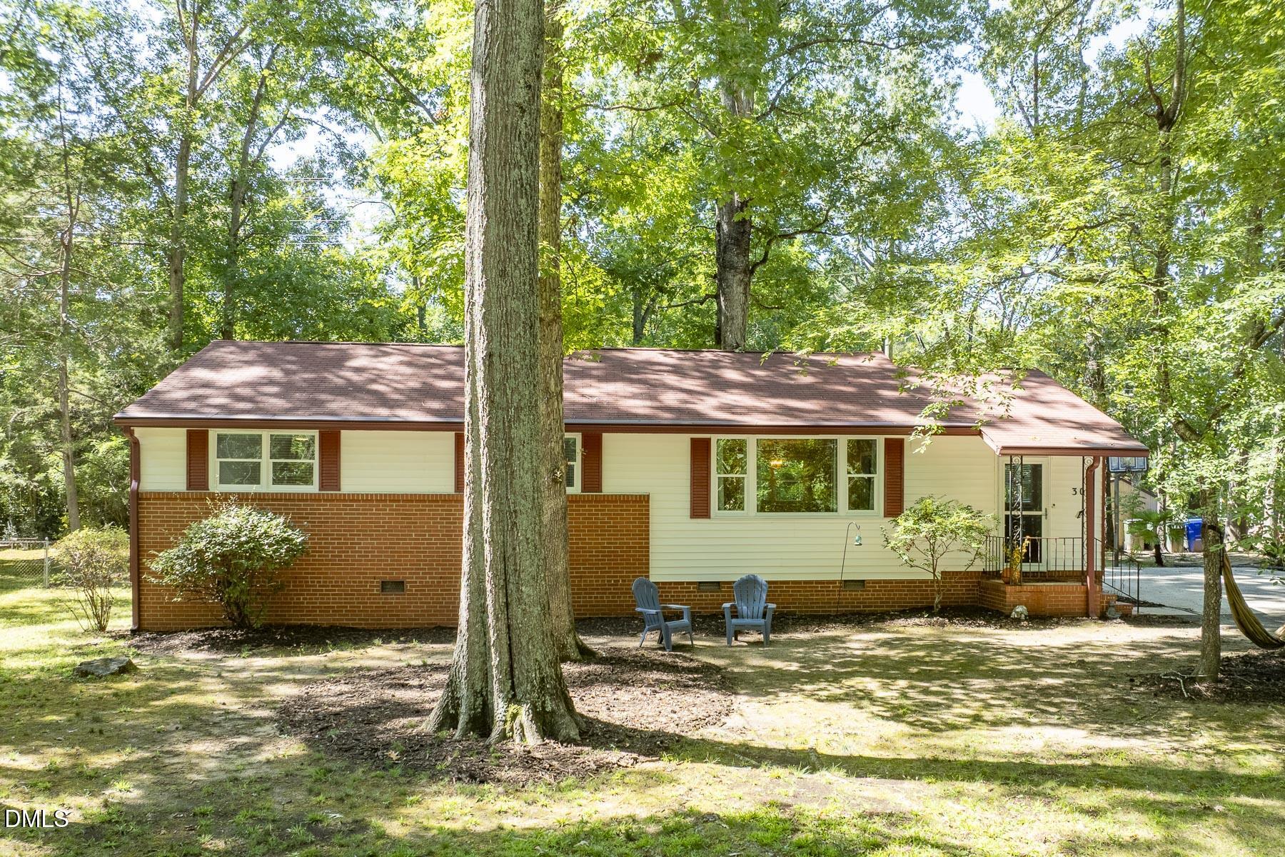 Exterior photo of 303 Hickory Drive, Chapel Hill, NC 27517. MLS: 10192227