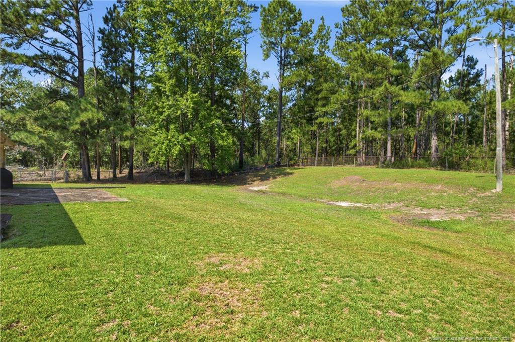 Exterior photo of 8220 NC 210 S, Bunnlevel, NC 28323. MLS: 768799