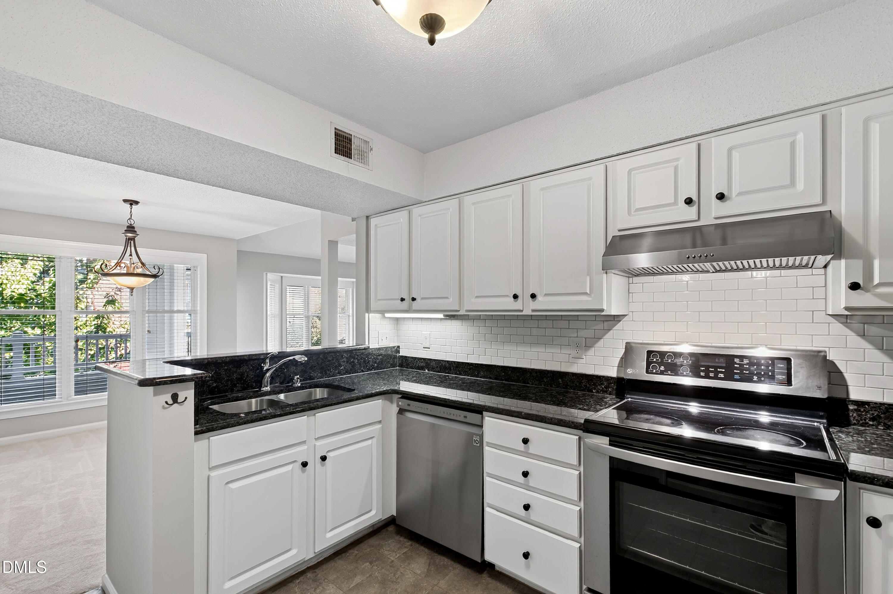 Exterior photo of 1061 Wirewood Drive 301, Raleigh, NC 27605. MLS: 10189228