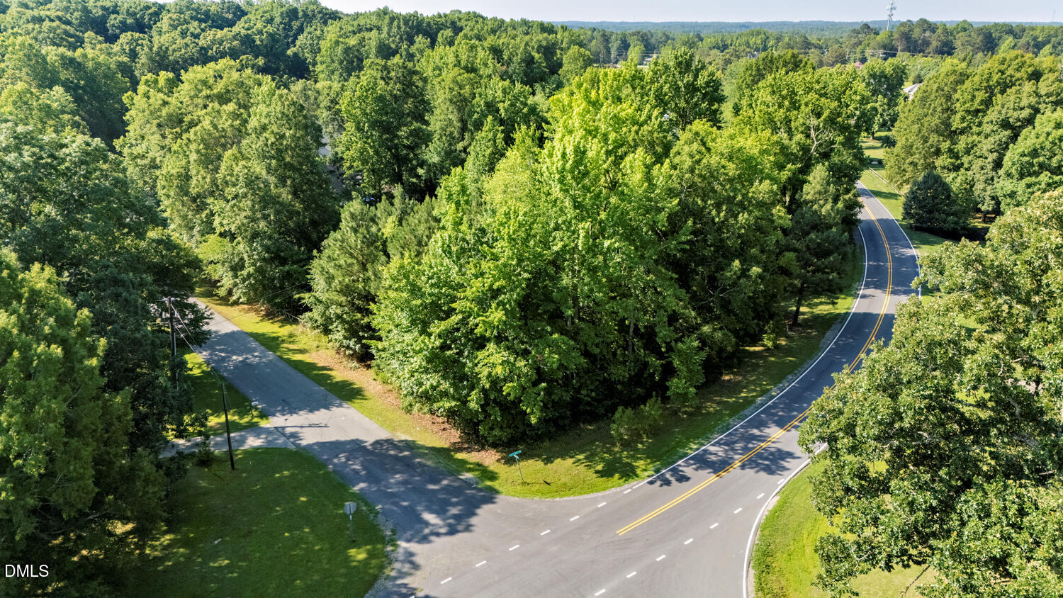 Exterior photo of 5303 Forest Oaks Drive, Greensboro, NC 27406. MLS: 10178328