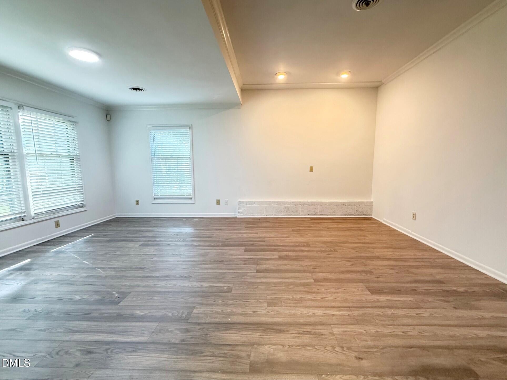 Exterior photo of 1421-a Lynn Road, Raleigh, NC 27612. MLS: 10185049